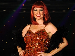 Bonnie Kilroe onstage performing her Broadway Show - Celebrity Imposters